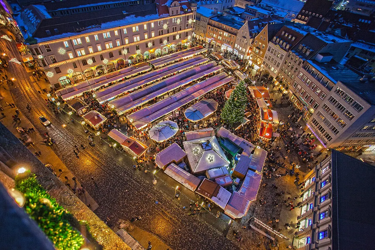 The market on Rathausplatz at the blue hour, seen from the Perlachturm
